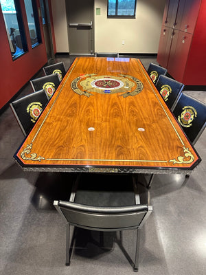 Custom wood top firehouse dining table for the Polk County Fire Department with custom chairs surrounding the table