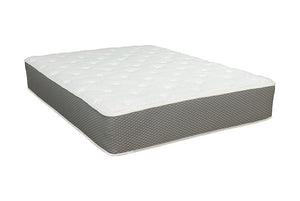 Angled side view of a 11'' all-foam firehouse mattress with latex and memory foam