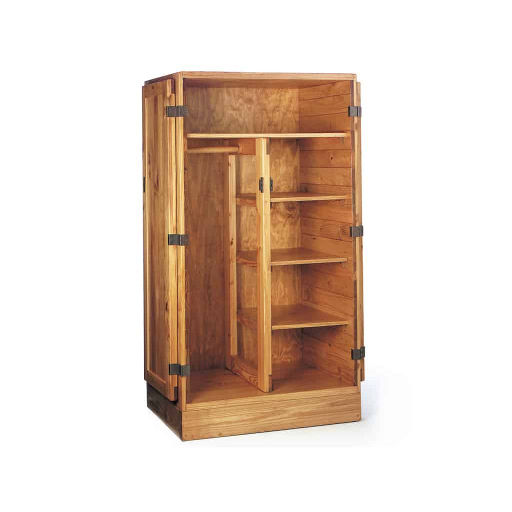 Large, solid-wood wardrobe open with shelves for a fire station bedroom