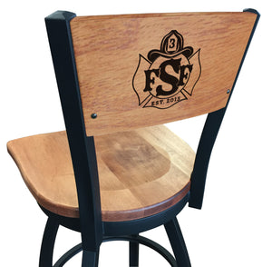 Close up of logo on the custom American firehouse furniture swivel barstool with wood back, wood seat and powder coated frame