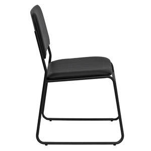 Side view of a black vinyl stacking fire station chair with black powder-coated frame finish