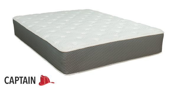 11'' all-foam firehouse mattress with latex and memory foam with Captain logo in lower left-hand corner of image