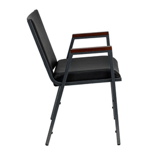 Side view of black vinyl, heavy-duty stack, custom fire station chair with arms and silver vein powder coated frame finish