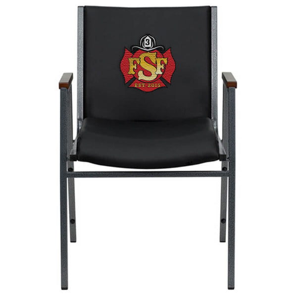 Front view of black vinyl, heavy-duty stack, custom fire station chair with arms and silver vein powder coated frame finish